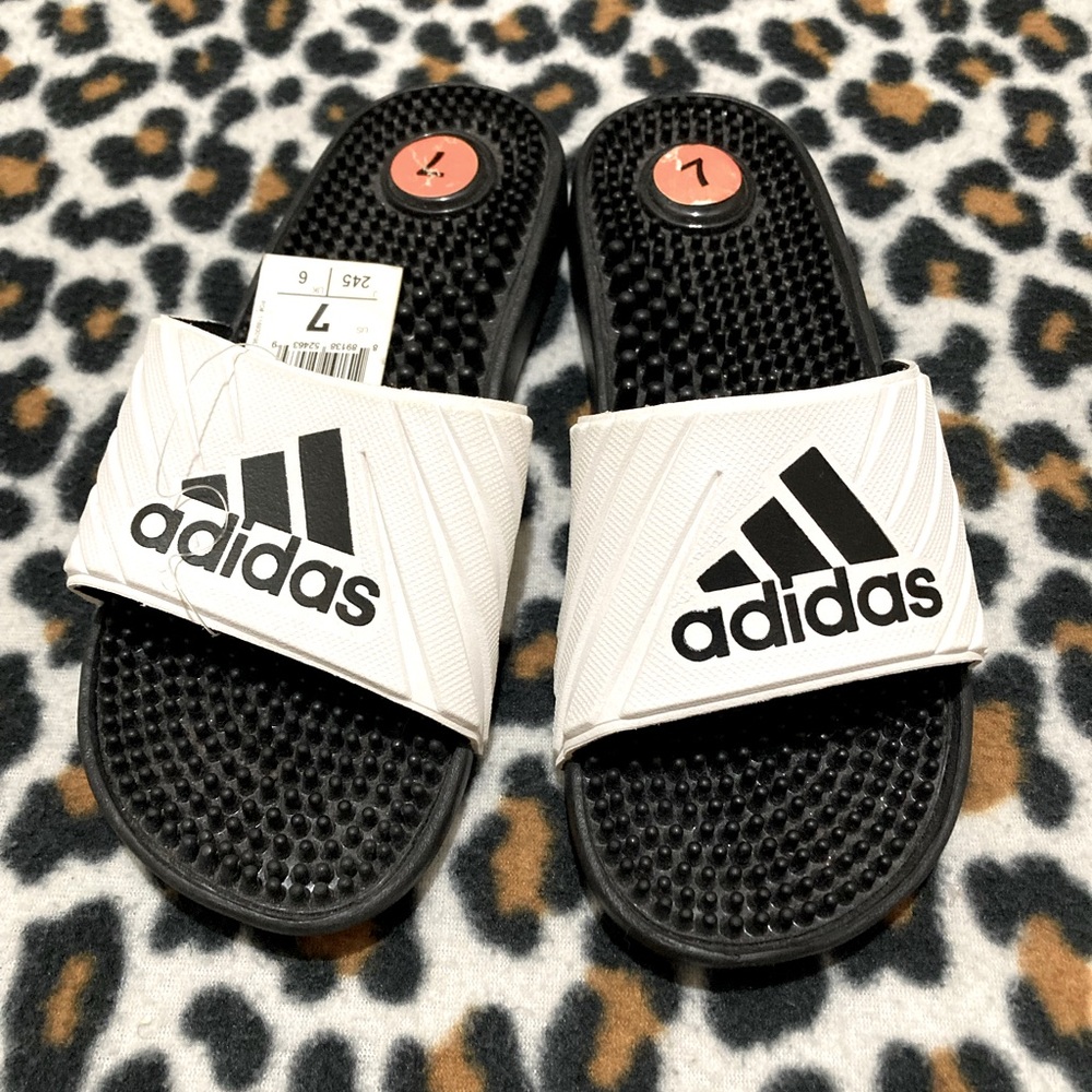 White and black Adidas Slips Size 7 in women’s Brand new